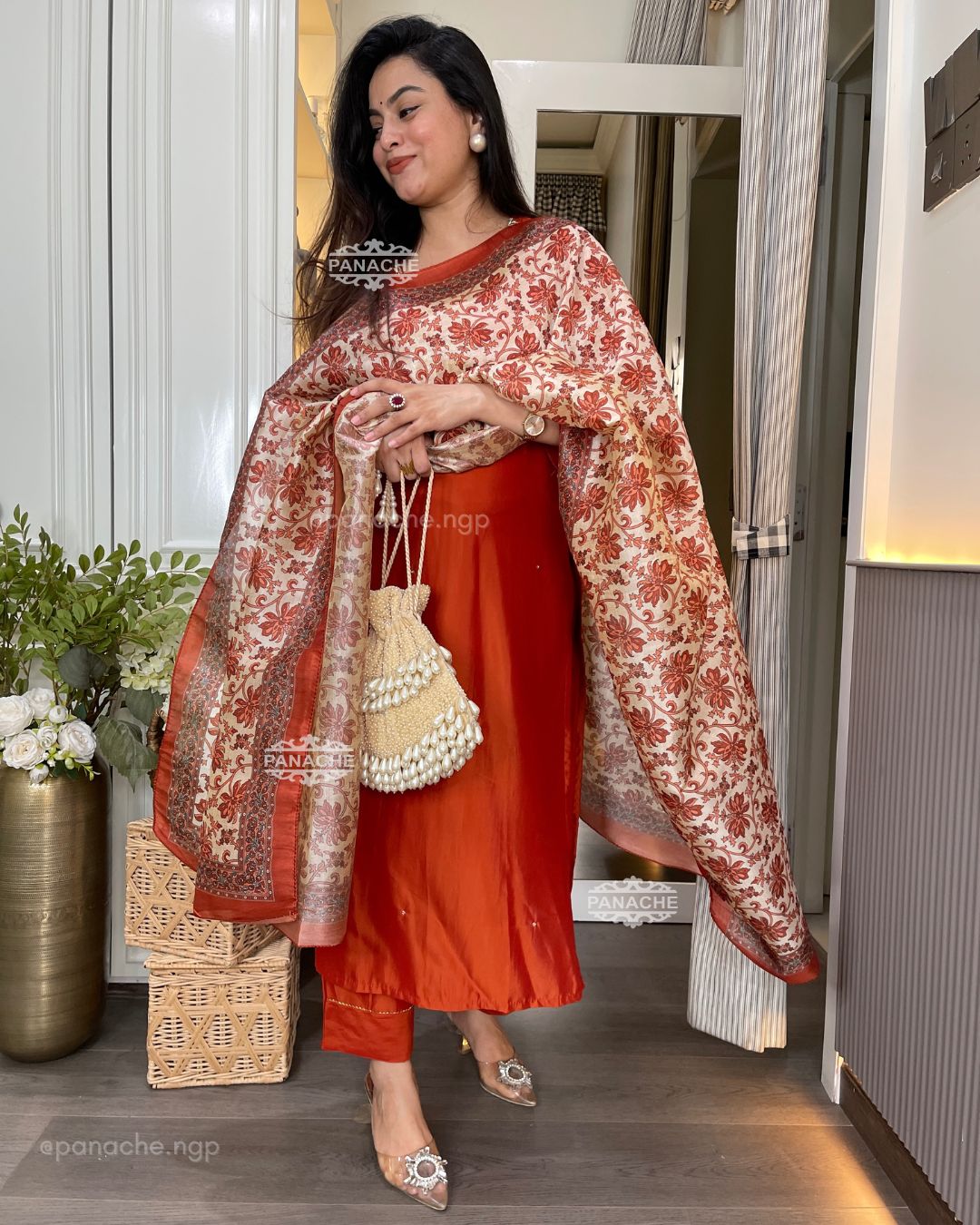 Shades of rust & orange suit