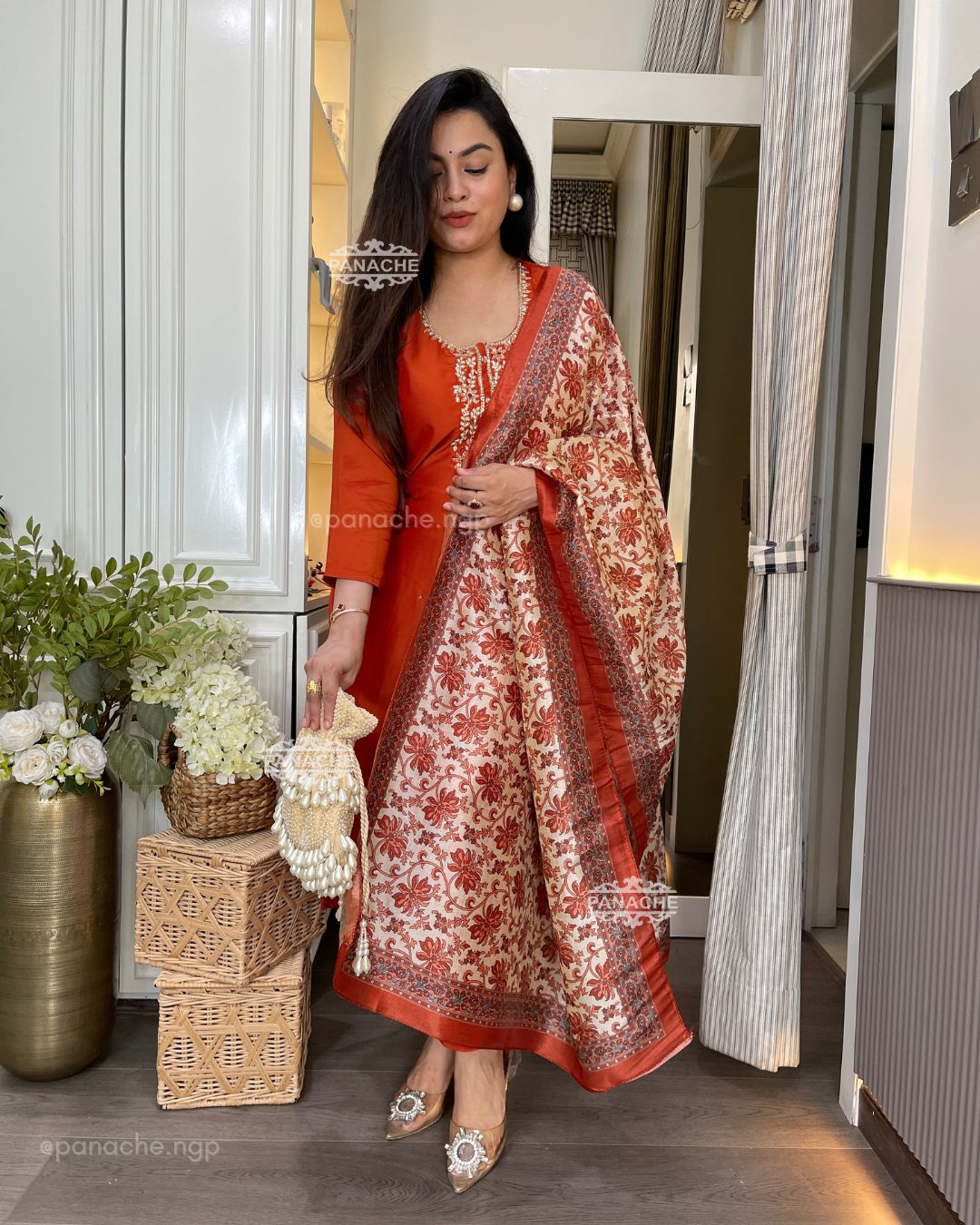 Shades of rust & orange suit