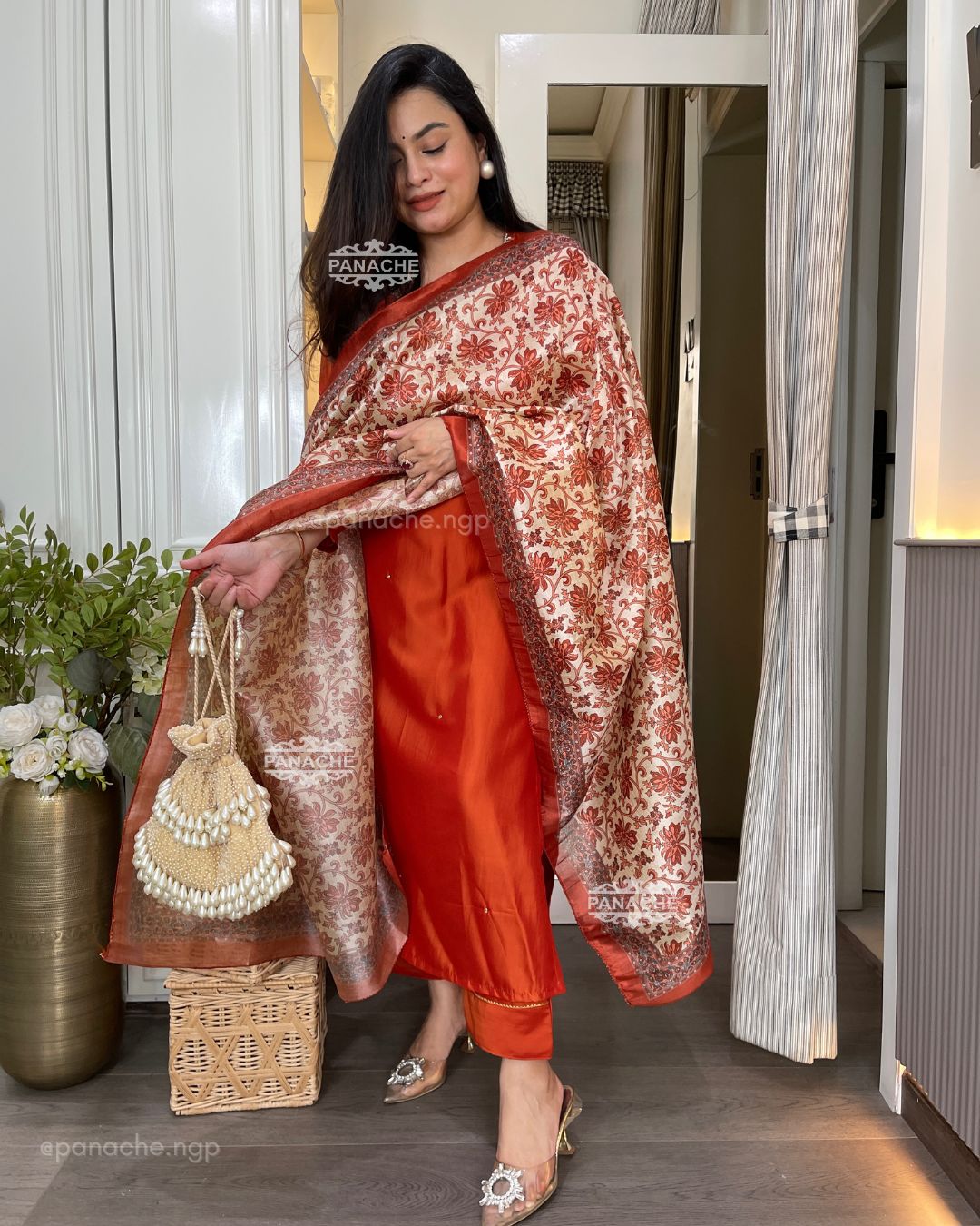 Shades of rust & orange suit